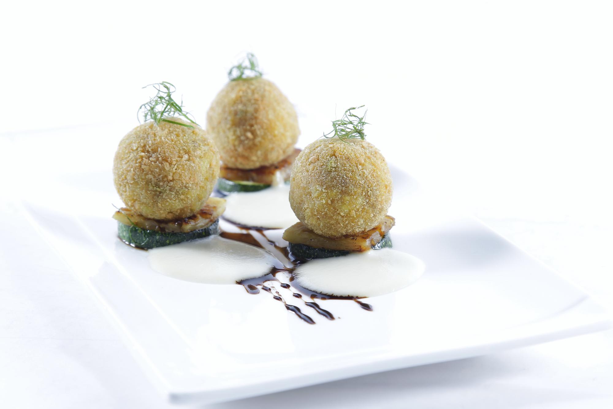 Artful plated dessert with gold leaf